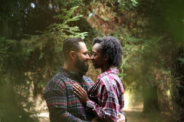 Man and woman embracing in a park